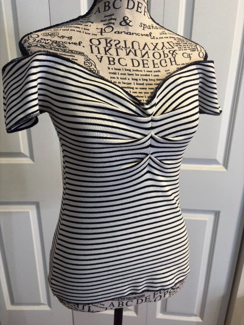 Black/White striped MISA top in size M